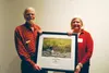 Ruth Wood and John Strasenburgh accept an award at Great Land Trust’s annual winter fundraiser and celebration in 2013, for choosing to conserve their land. These Talkeetna landowners are “Ki