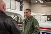 U.S. Air Force Lt. Gen. David Nahom, commander, Alaskan North American Aerospace Defense Command Region, Alaskan Command and Eleventh Air Force, speaks with Brian Porter, the Director of Oper