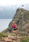 Christy Marvin of Palmer sprints to the finish line at the top of Bird Ridge for the 2016 Robert Spurr Memorial Hill Climb on Sunday, June 19. Marvin won the race up Bird Ridge and will be ru