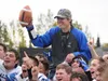 Palmer football coach Rod Christianson celebrates his 151st career coaching win with the Moose, Saturday at Ed Hollier field in Kenai. The milestone victory placed Christianson atop the all-t