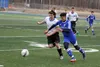Palmer senior captain Reed Godden battles for possession during the second half of a 3-2 Northern Lights Conference loss to Kodiak Saturday, April 28, 2018, at Palmer High School. JEREMIAH BA
