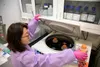 Misook Choe, a Laboratory Manager with the Emerging Infectious Disease branch at the Walter Reed Army Institute of Research, conducts studies in order to find a solution for the Coronavirus, 
