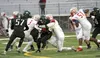 Colony running back Cade Havel drags tacklers during a win over Wasilla earlier this season. Colony hosts Dimond Oct. 9 at 7 p.m. in the first round of the large-schools state playoffs. Court
