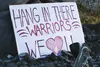 A sign outside of Wasilla High School expresses support in the wake of a student's suicide. BRIAN O'CONNOR/Frontiersman