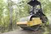ROBERT DeBERRY/Frontiersman Doug Hill, Palmer Hay Flats refuge
manager for the Alaska Department of Fish and Game, packs down a
new section of trail around Reflections Lake. Robert DeBerry
