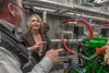 Curtis W. Thayer, Executive Director of AEA, speaks to Sen Shelley Hughes, Wasilla, during the Nelson Lagoon Powerhouse open house. J. David McChesney/Frontiersman