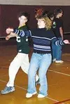 Joe Hunner and Christi Gibson swing dance last week. Dance was
one part of a larger unit in which students learned about healthy
lifestyles they can enjoy with their families. Photo by CASEY
