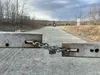 A locked gate blocks the road to Matanuska Lake State Recreation Area. Officials said they plan to open the gate for the summer season despite not finding a contractor to manage the area. Amy
