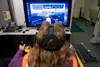 Diane Morelli, a member of the 3rd Maintenance Squadron, participates in deicing simulator training at Joint Base Elmendorf-Richardson, Alaska, Oct. 8, 2020. The deicing simulator allows the 