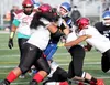 Houston defensive lineman Kiderro Fono hits Palmer's Lucas Frank near the goal line during Palmer's win over the Hawks Sept. 3, 2020. Jeremiah Bartz/Frontiersman