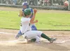 ROBERT DeBERRY/Frontiersman Mat-Su Miner Ben Price collides at
home plate with the Three Rivers catcher Saturday at Hemon Brothers
Field. The Miners beat Three Rivers 20-1.