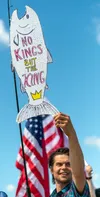 Nick Treinen was one of the attendees at the "No Kings" Rally at the intersection of Glenn Highway and Palmer-Wasilla Highway in Palmer, Saturday June 14. J. David McChesney/Frontiersman.com