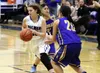 Palmer senior Julia Benshetler splits a pair of defenders during a 52-32 win over the Kodiak Bears Friday at Palmer High School. Courtesy of Bruce Eggleston/matsusports.net