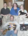 Pat Felthauser, a disabled veteran confined to a wheelchair,
with his family, from left: daughter Laura, mother-in-law Bonnie
Feakes, wife Candy and daughter Angelyn. Family members were
help