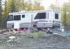 The motor home now occupied by the Burts family sits at the
utility site for the property. Nearby is the well and telephone
service now serving the property. The Burtses hope to have power to