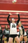 Colony senior Mackenzie Everett sets the ball during a 3-2 win over Wasilla Thursday at Wasilla High School. Everett finished with 28 assists and eight digs in the match. Courtesy of Bruce Eg