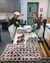 Since 1991, hundreds of volunteers have gathered to prepare a quality meal and share a slice of joy with each and every person that walks through the doors of the Curtis D. Menard Center in W