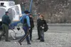 (MICHAEL ROVITO/Frontiersman) Carrington Ewers and Zander
Lofgren walk from a state trooper helicopter Monday after being
rescued from the Metal Creek area. The boys were both in good
conditi