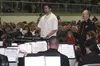 CASEY RESSLER/Frontiersman Sgt. Tyler Hall leads the U.S. Army
Field Band and Soldiers Chorus in a rendition of "Stars and Stripes
Forever" as Col. Finley Hamilton watches. Hall leaves tomorr