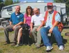 Dogs for the Deaf CEO Blake Matray, left, and Alaska Good Sam Club Director Darwin Fischer, right, flank Two Rivers residents Mark and MaryAnn Carey with MaryAnn’s new service dog, Jan. The b
