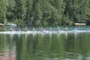 ROBERT DeBERRY/Frontiersman The Anchorage Rowing Association
eight-woman team crosses the finish line during the Moose Nugget
Regatta on Wasilla Lake last year.