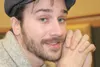 Portugal. The Man's lead singer and guitarist John Gourley -
originally from Willow - smiles during an interview at the Denali
Family Restaurant Wednesday morning. Gourley said he was painful