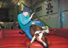 Tom Blazka takes a spin on the mechanical bull during the Santa Cops and Hereos Barn Dance fundraiser at the Curtis D. Menard Memorial Sports Center in Wasilla. This year’s dance is 6 p.m. to