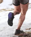 A runner makes the transition from mud to snow during the 2016 Crazy Lazy Mountain Race on Lazy Mountain in Palmer. The 2017 race, held March 25, featured a record number of about 230 racers.