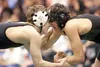 Former Colony High wrestler Wade Booth competes against South's Zach Ritchie as a sophomore in this Frontiersman file photo. Booth, a 2014 graduate of Colony High, will wrestle next year at G