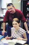 Nastaya Carnaham, a Russian volunteer, helps tutor Russian
students at Tanaina Elementary. Her husband, Jesse, works at
Tanaina as a temporary bilingual tutor. The Carnahams help the
school t