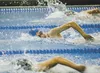 Palmer swimmer Katie Stark swims to what at the time was a new school record of 54.64 seconds in the 100-yard freestyle during the Valley Invitational swim meet earlier this season at Palmer 