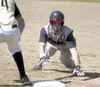 Alaska Road Warriors infielder David Newman slides back into first base during a game against South Anchorage earlier in the season. Newman and the Road Warriors begin state tournament play S