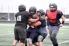 The Colony Knights work through team drills during practice Wednesday at Colony High. Jeremiah Bartz/Frontiersman