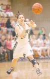 ROBERT DeBERRY/Frontiersman Colony senior Maria Bowker pushes
the ball toward a teammate during a Colony win over Kodiak on
Friday at Colony High School. Bowker is one of eight seniors who
re