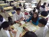 Palmer High School senior Peyton Murphy takes instruction from a high school teacher in Saroma, Japan. Murphy participated in a two-week exchange this summer as part of the Palmer Saroma Kai 