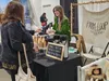Farm Loop Coffee employee Kindra Quarterman offers samples at the Winter Carnival. Jacob Mann/Frontiersman