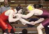 Wasilla wrestler Jed Wade, left, measures up Dimond wrestler
Daniel Gordon in the first round of the 189-pound match between
Wasilla and Dimond Saturday. Photo by TIM BRODT/Frontiersman.