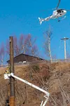 In an impressive bit of flying, a helicopter was to string wire for a new Matanuska Electric power line along the bluff near the old Matanuska townsite. The line will carry power between MEA’