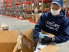 Brandon Gerber, a supply technician with Defense Logistics Agency Distribution Susquehanna, Pa., packs ancillary kits for the COVID-19 vaccine, Dec. 22, 2020.