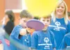 Finger Lake Elementary student Alex Davis, 11, takes aim with a
disc during a collaborative event between the Special Olympics and
the Mat-Su School District Wednesday at the AT&amp;T Sports 