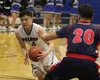 Palmer guard Dae Osiensky drives the paint during a win over North Pole on the first day of the Palmer Elks Showdown Jan. 18,2018, at Palmer High School. Jeremiah Bartz/Frontiersman
