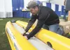 ROBERT DeBERRY/Frontiersman Mike Hudson of 3 Rivers Fly and
tackle assembles an inflatable boat for the 2011 Mat-Su Outdoorsman
Show, which begins today at noon and runs through Sunday at the