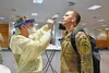 - A medical professional from the Wiesbaden Army Health Clinic administers a COVID-19 test to a Soldier June 30 at the Mission Command Center at U.S. Army Garrison Wiesbaden. The tests were g