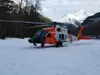 An MH-60 Jayhawk helicopter from Coast Guard Air Station Sitka sits on a snowy riverbank in Alaska, April 25, 2021.