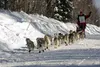 Aliy Zirkle waves to spectators as she heads out on the 40th running of the Iditarod Trail Sled Dog Race Sunday March 4, 2012 in Willow. Sixty-six mushers left the starting line headed for No