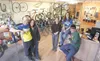 ROBERT DeBERRY/Frontiersman It’s a friendly crew at backcountry
Bicycles in Palmer. From left are shop owner and mechanic Tony
Berberich, bookkeeper and wife, Julie, backcountry guide and
mec