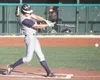 Ben Ross connects with a pitch during an 8-1 win over Bartlett. JEREMIAH BARTZ/Frontiersman