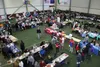 Hundreds of volunteers, service organizations and people experiencing homelessness find their places at Project Homeless Connect in the Menard Center in this 2016 Frontiesman file photo. Fron