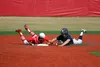 Soldotna's Cody Quelland slides into second base beating the tag attempt by Wasilla shortstop Balas Buckmaster during Wasilla's 12-9 win over the Stars Saturday afternoon at Wasilla High Scho