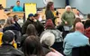 Polly-Beth Odom, Executive Director of Daybreak, Inc, speaks during a recent meeting to address acute vagrancy in Palmer. "I want to be part of the solution," she told the audience. Katie Sta